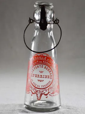 Antique French milk bottle with red transfer label 9¾"